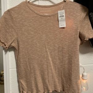 Adorable super soft light pink colored American Eagle Tea.